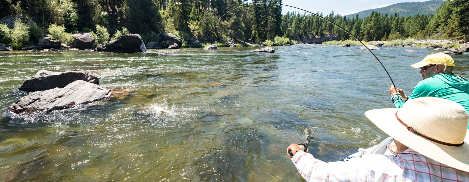 Pro Outfitters Guest with a Fish on the Line